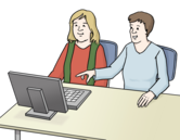 Zwei Personen sitzen vor einem Computer, ein Mann erklärt der Frau etwas am Computer